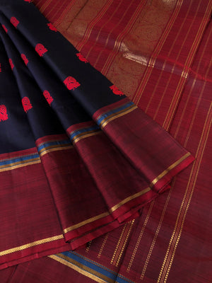 Kaavyam on Kanchivaram - the one of a kind deep mid night black blue body with annapakshi woven buttas with deep maroon borders pallu and blouse