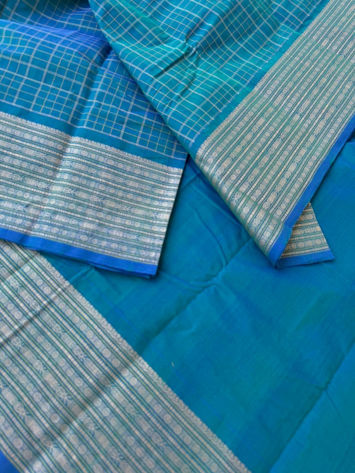 Mangalavastaram - dual tone teal with fish woven borders