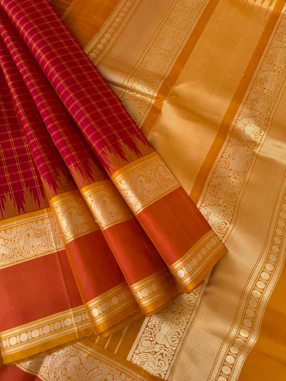 Silk Play on No Zari Kanchivaram - traditional red and mustard kattam woven body with yali woven retta pett borders