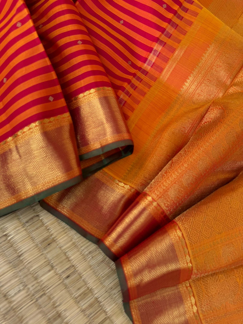 Kattam Koodu on Kanchivaram - red and rusty koodu ( Stripes ) with solid gold zari woven borders