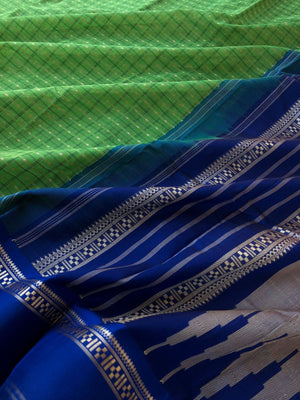 Mira - Our Exclusive Cotton body with Pure Silk Korvai Borders - parrot green and ms blue Lakshadeepam