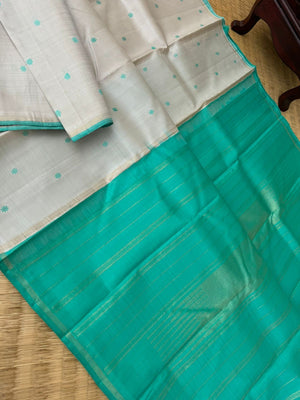 Bliss of Kanchivaram - calcium pale off white with aqua blue green with buttas woven body