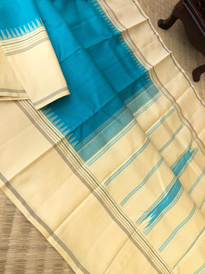 Kaavyam on Korvai Kanchivaram - gorgeous turquoise blue and creamy off white ( venn pattu ) tone borders pallu and blouse