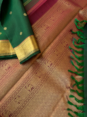 Swarnam - Stunning Solid Border Kanchivarams - the classy deep dark meenakshi green and maroon at its best