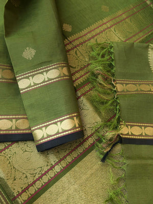 Zari Kissed Silk Cotton - stunning olive green kolam buttas with retta pett woven borders