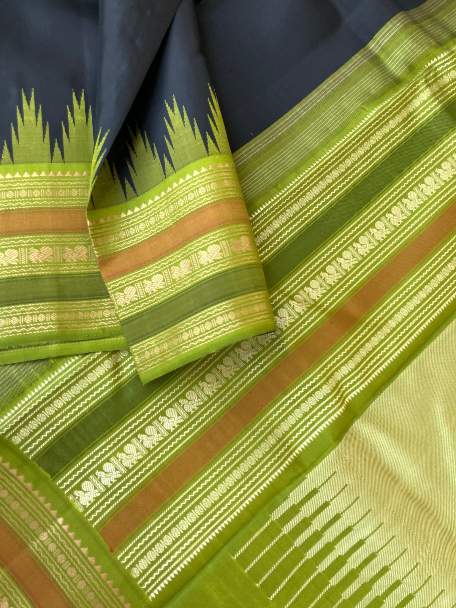 Sahasra - Beauty of No Zari Korvai Kanchivaram - black and olive green with intricate woven borders