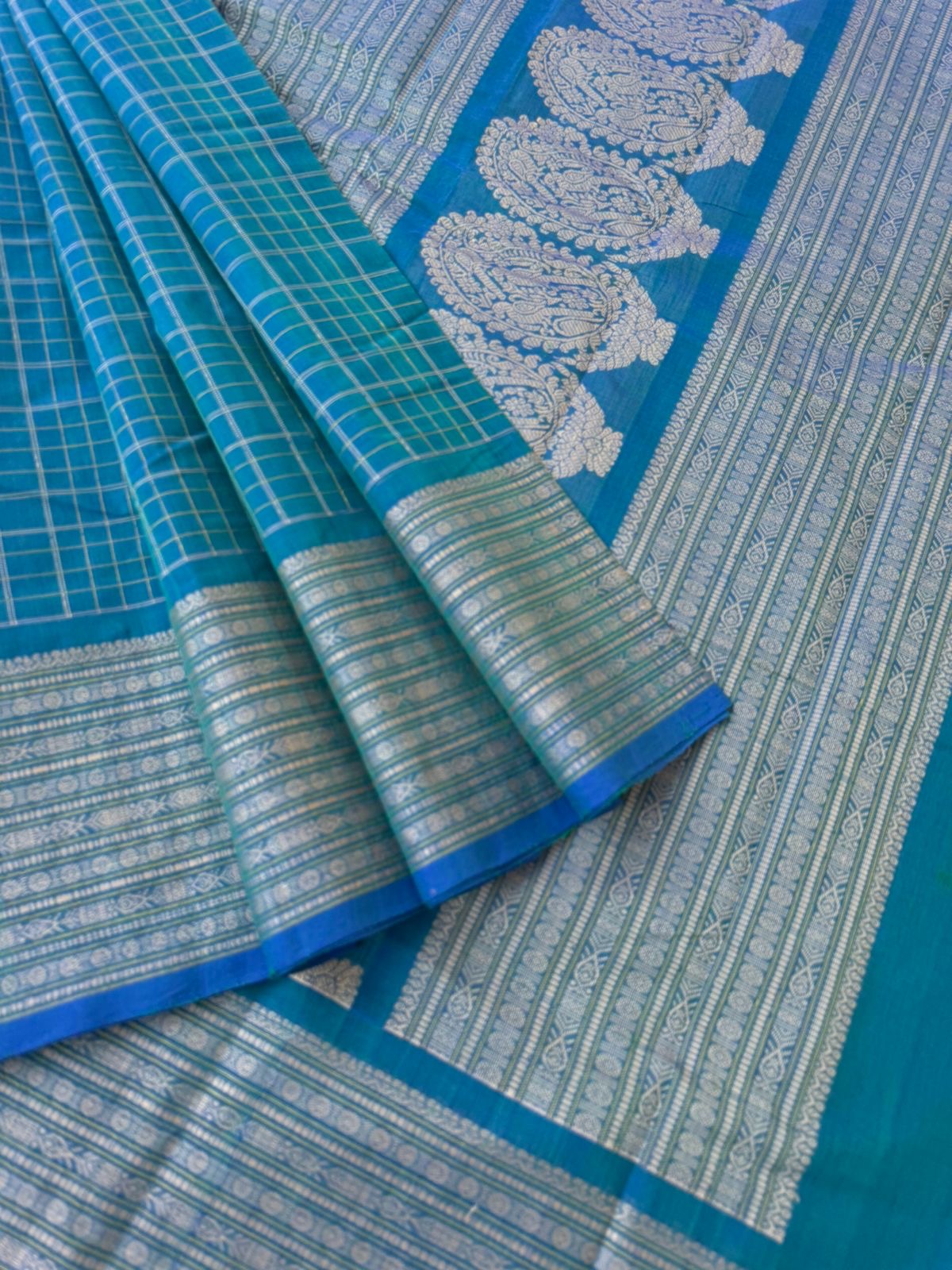 Mangalavastaram - dual tone teal with fish woven borders