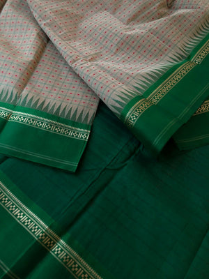 Mira - Our Exclusive Cotton body with Pure Silk Korvai Borders - deep beige and Meenakshi green Lakshadeepam