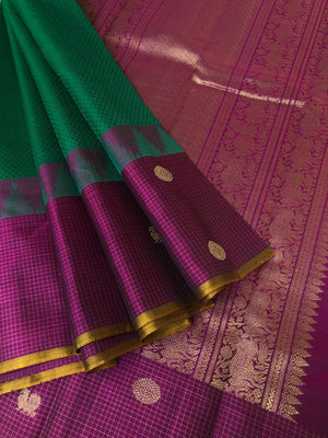 Meenakshi - Heirloom Kanchivaram - beautiful Meenakshi green and deep dark purple oosi Kattam and mayil chackaram woven borders