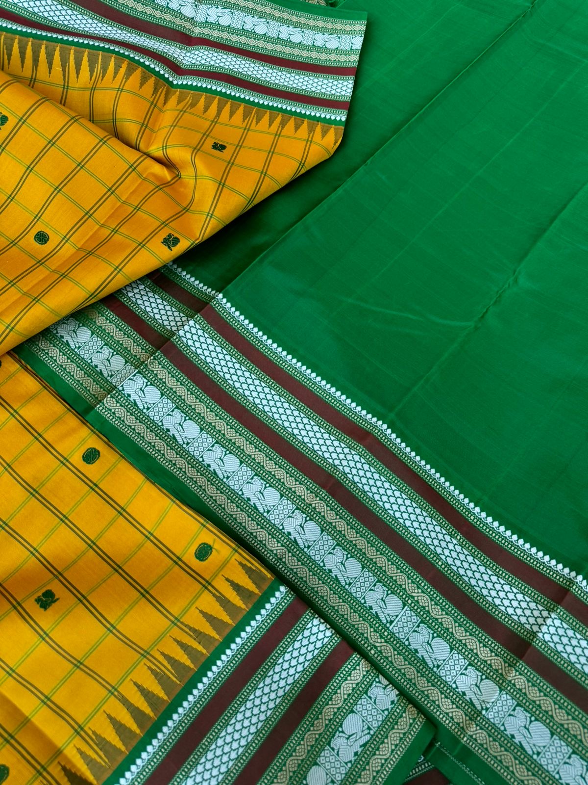 Pattu Pett - Exquisite No Zari Kanchivarams - mustard green with kattam and buttas woven borders with varusai pett motifs