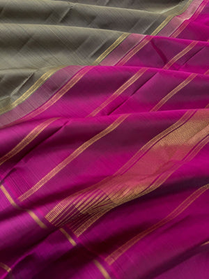 Bliss of Kanchivaram - black and grey oosi strips woven body with majentha borders pallu and blouse