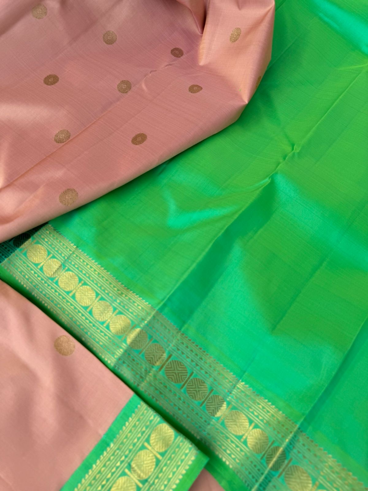 Interesting Kanchivarams - such a stunning rose gold and dual tone aqua green with small korvai woven rudurakasham borders