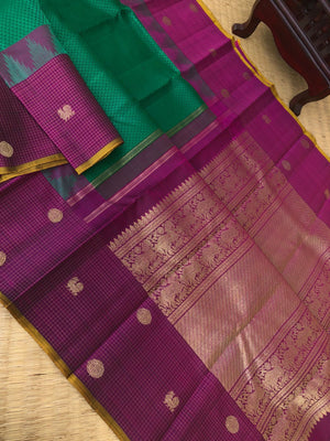 Meenakshi - Heirloom Kanchivaram - beautiful Meenakshi green and deep dark purple oosi Kattam and mayil chackaram woven borders