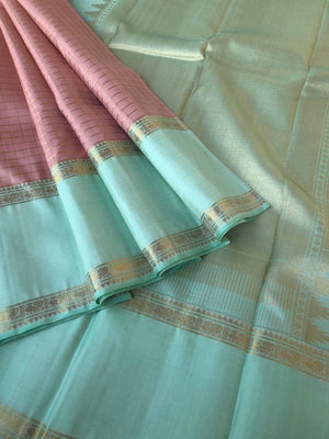 Pastel Ragas on Kanchivaram - dusky pastel rose gold muthukattam with 8 koll gold zari woven pallu