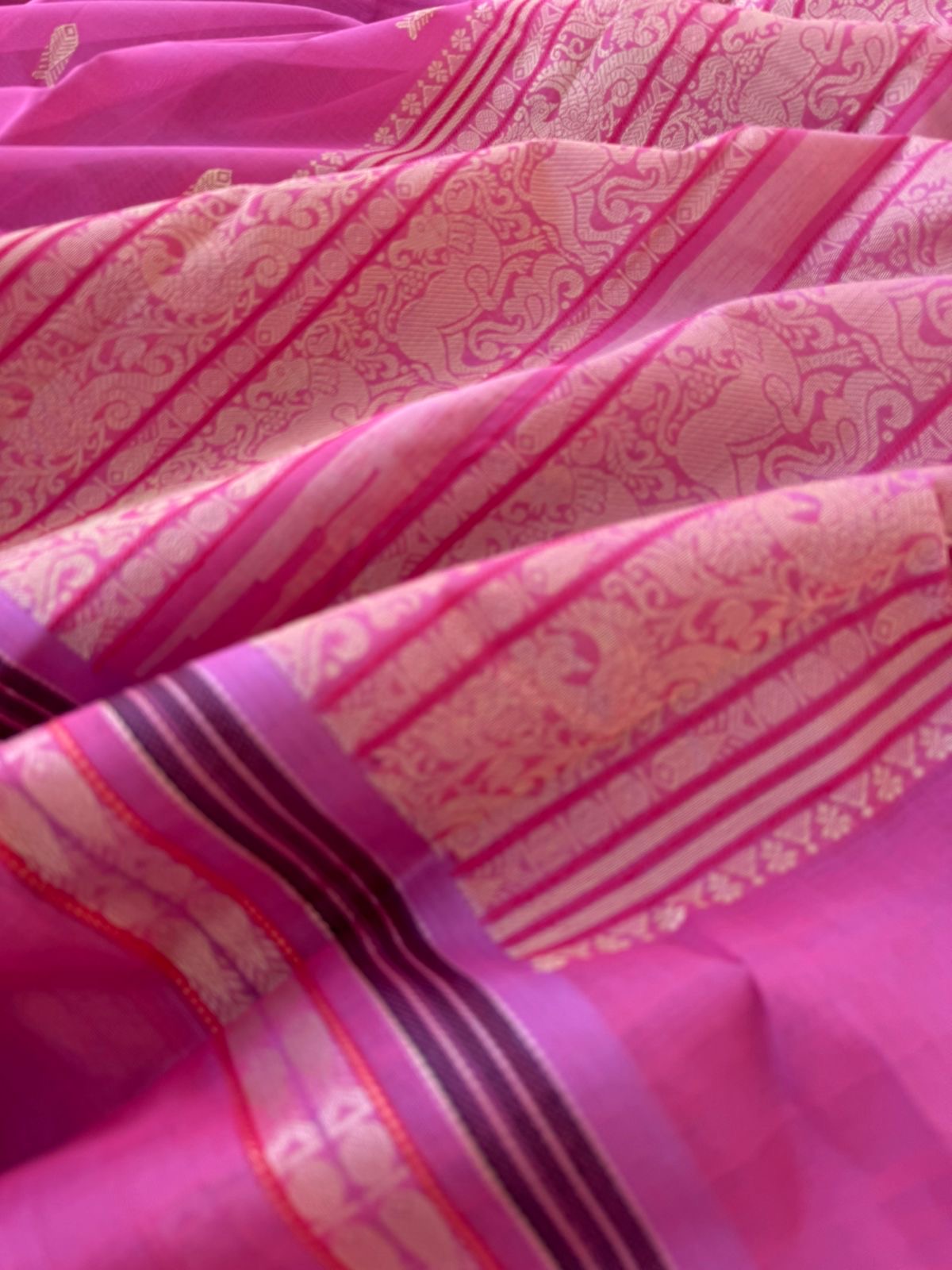 Mangalavastaram - elegant rose pink with fish woven buttas