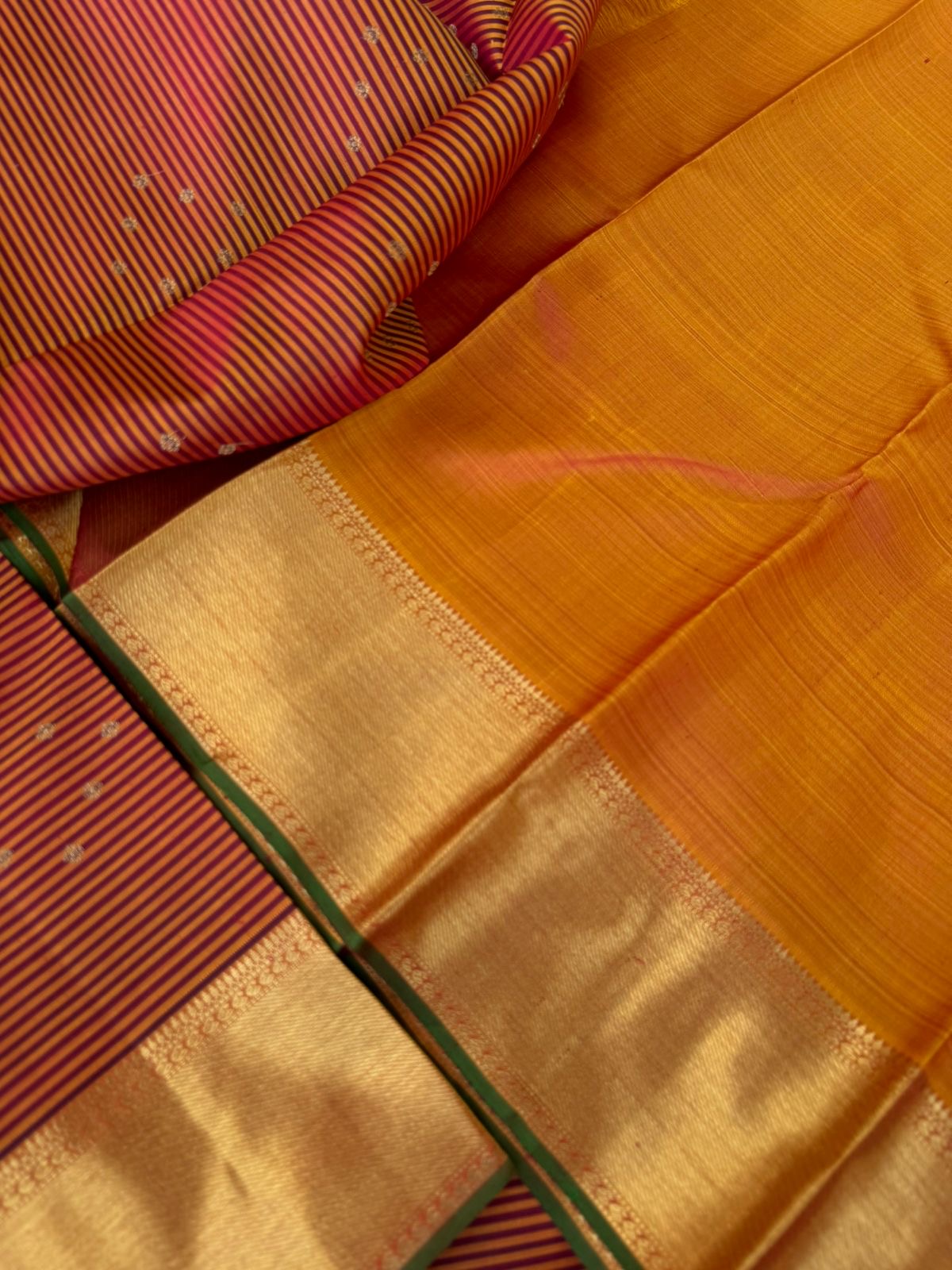 Kattam Koodu on Kanchivaram - stunning vintage oosi vaalapoo koodu on mustard and maroon with body with eight dots woven buttas with solid gold zari woven borders