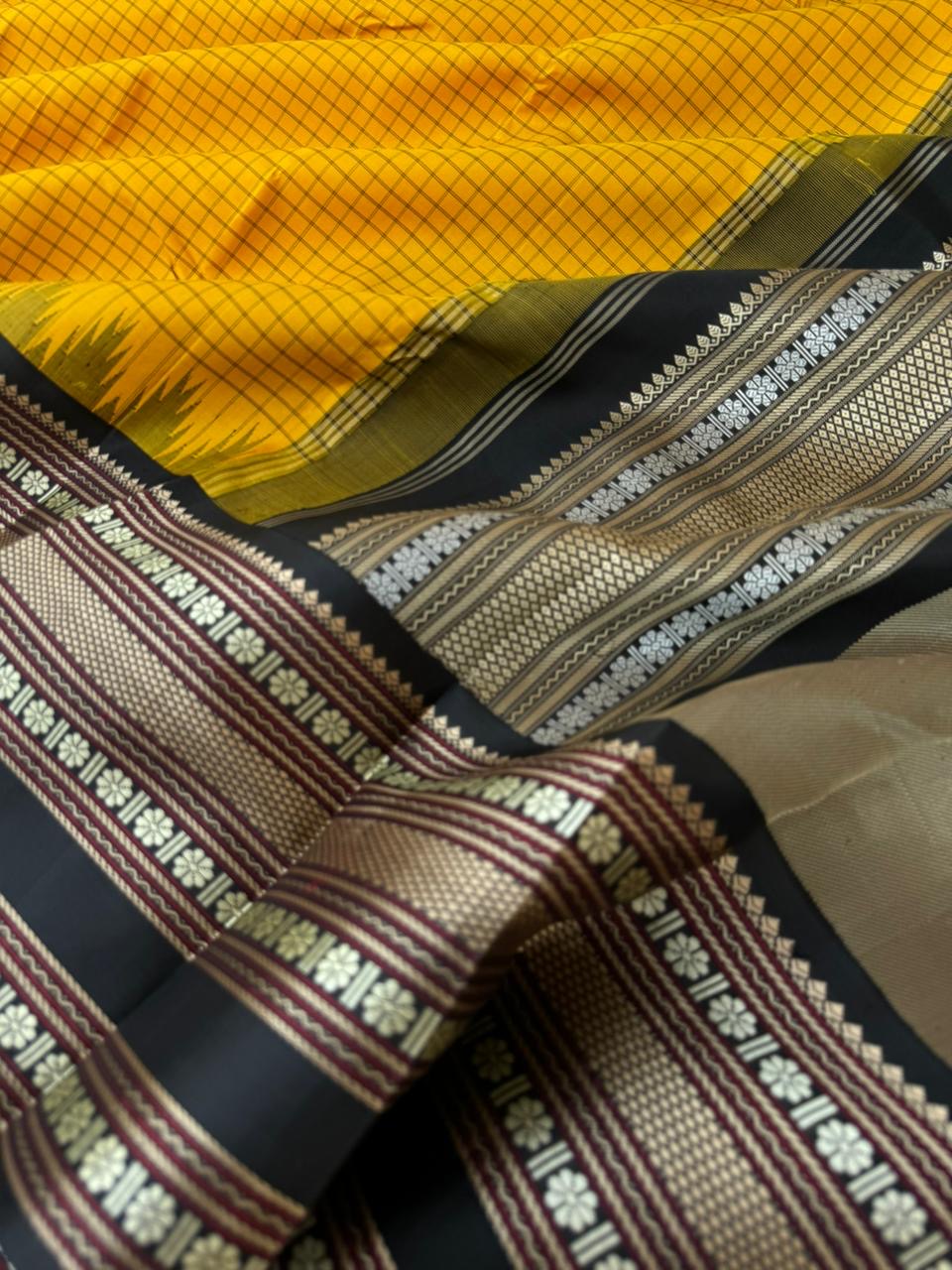 Silk Play on No Zari Kanchivaram - amazing yellow and black with chex woven body with varusai pett woven borders