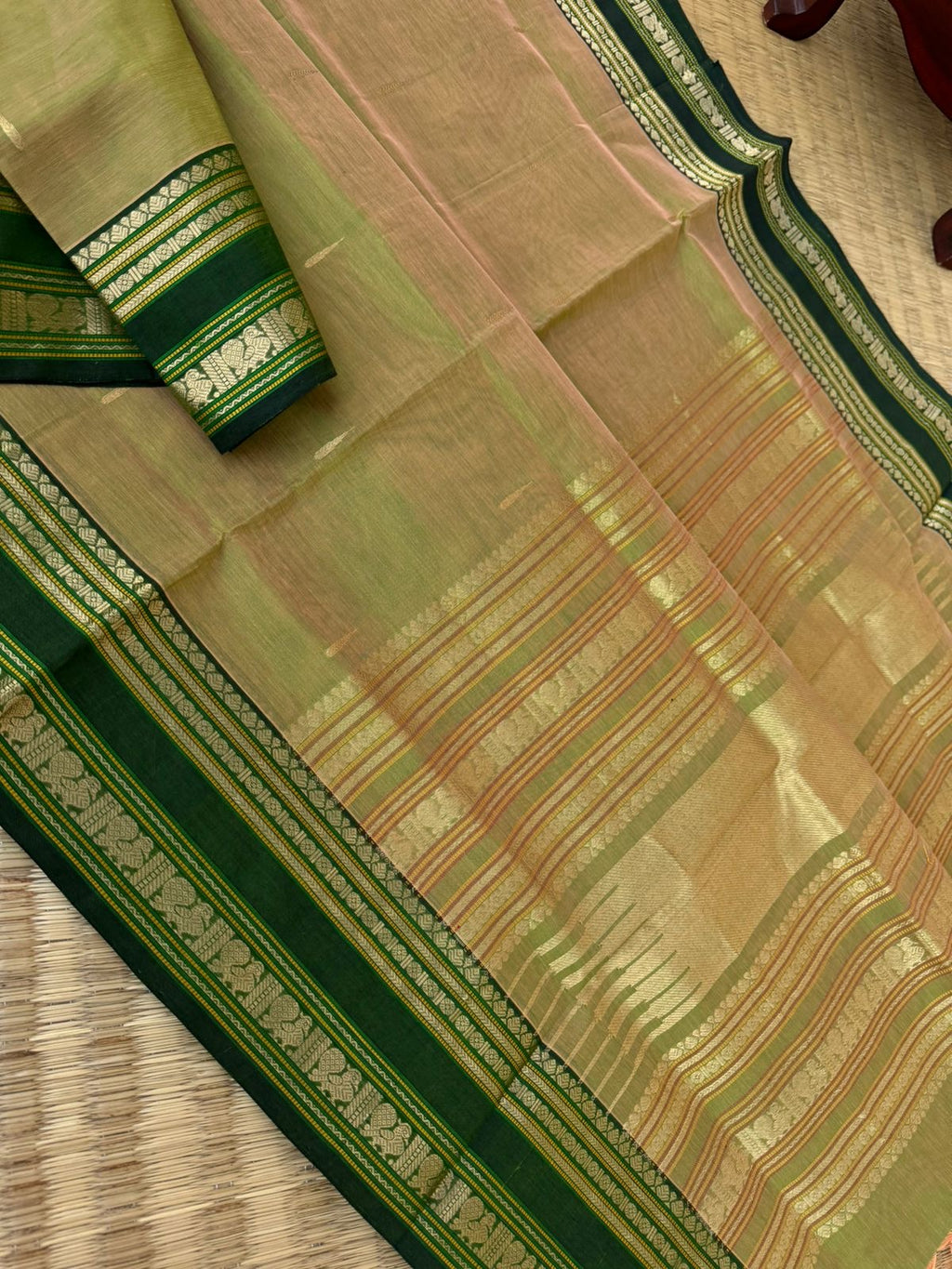 Zari Kissed Silk Cotton - unusual carrot orange and green mixed dual tone with annapakshi woven borders