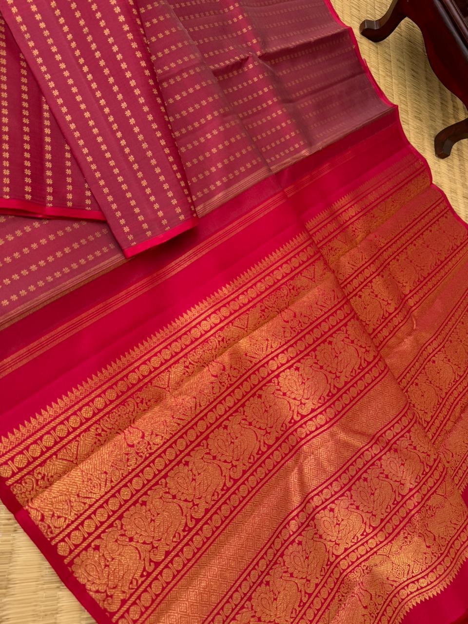 It is all about borderless kanchivarams - reddish maroon with all over tiny buttas