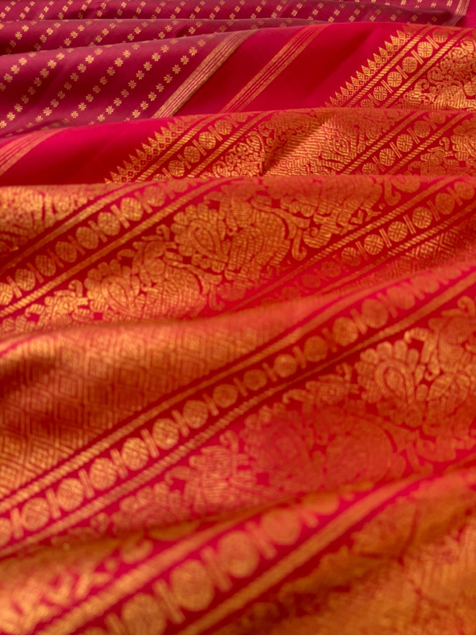 It is all about borderless kanchivarams - reddish maroon with all over tiny buttas