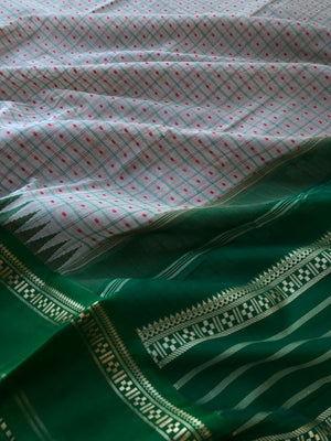 Mira - Our Exclusive Cotton body with Pure Silk Korvai Borders - greyish off white and Meenakshi green Lakshadeepam