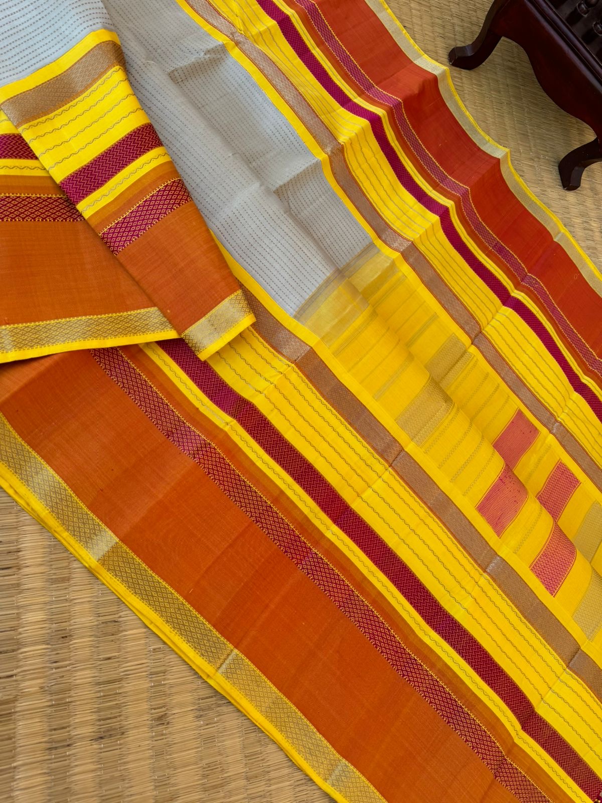 Statement of Kanchivaram - KK7 - most beautiful and most vintage style Kalakshetra no zari korvai Kanchivaram with beige muthu strips woven body with lemon yellow and burnt orange woven borders this saree is definitely rare find piece