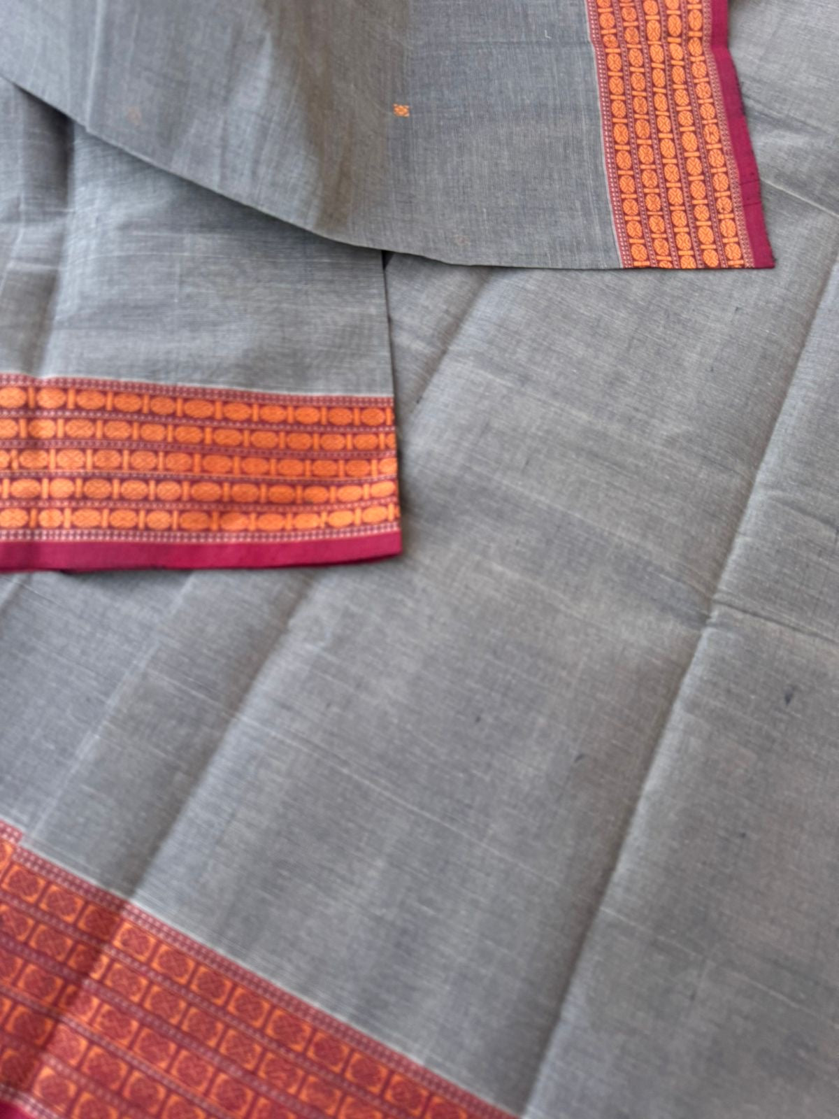 Mangalavastaram - elephant grey and rudurakasham woven borders