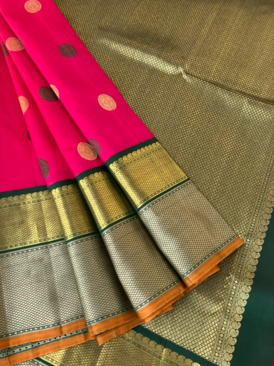 Vintage Vibes on Kanchivaram - the grandest pink and deep meenakshi green pattu and zari pett woven korvai borders with laddu kamalam woven borders