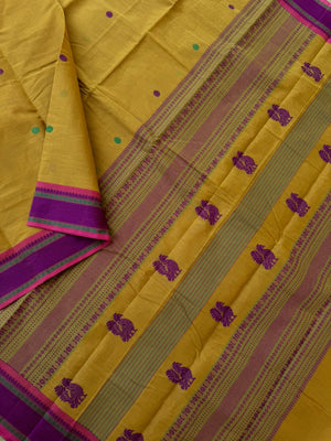 Mangalavastaram - pale mustard with annapakshi woven pallu