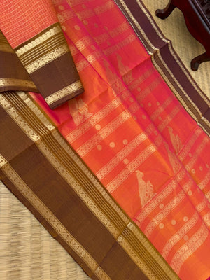 Zari Kissed Silk Cotton - gorgeous pink short orange lakshadeepam body with parrots woven pallu