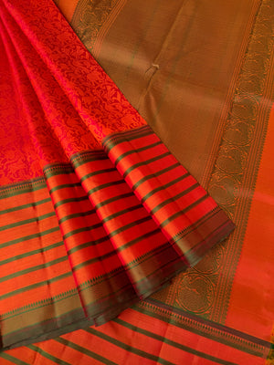 Haritham - Heirloom Yarn Play on Kanchivaram - rusty red vanasingaram woven body with varusai pett woven borders