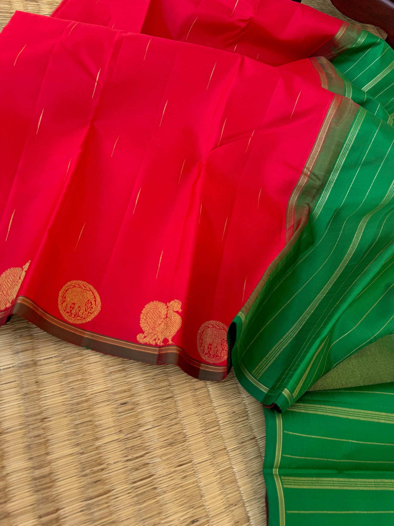 Kanchivaram Trunk - Every Day Essential Kanchivarams | tomato red and green with malli mokku woven buttas with annapakshi and elephant woven border buttas