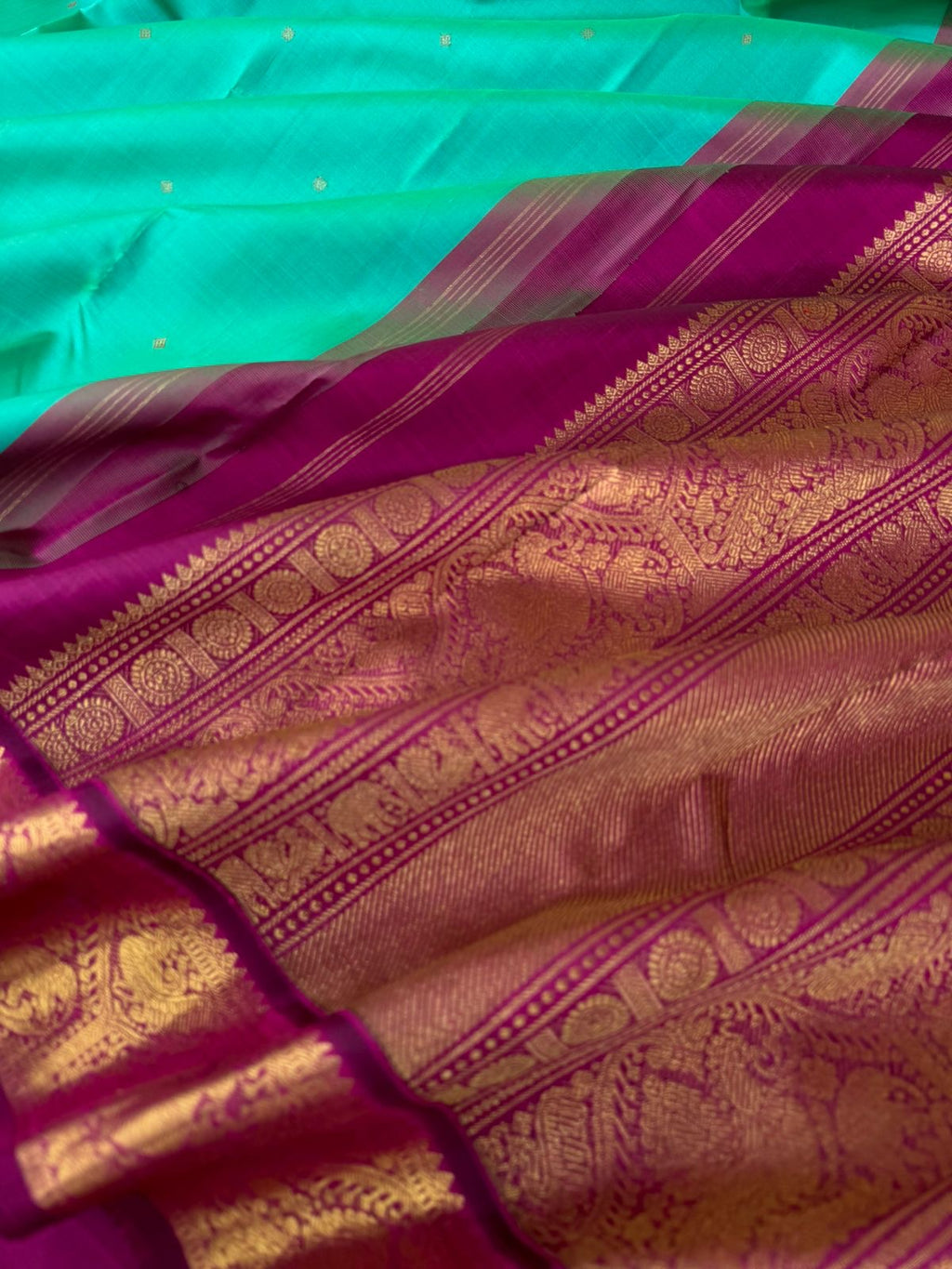 Connected by Korvais on Kanchivaram - beautiful dual tone aqua blue green and purple with annapakshi woven borders