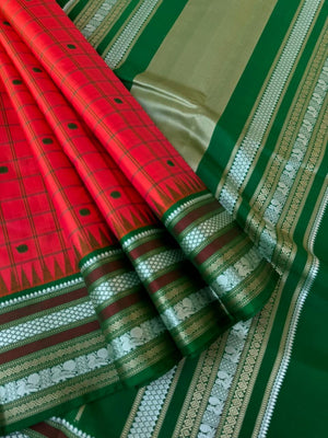 Pattu Pett - Exquisite No Zari Kanchivarams - orange and bottle green with kattam buttas