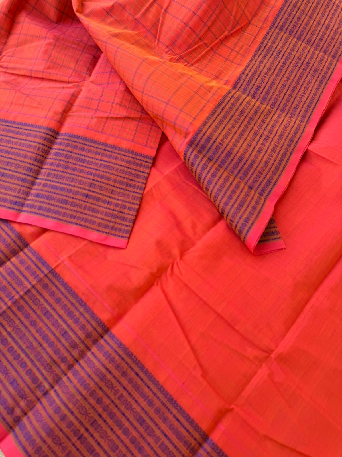 Mangalavastaram - peach orange mixed chex woven body with fish pett woven borders