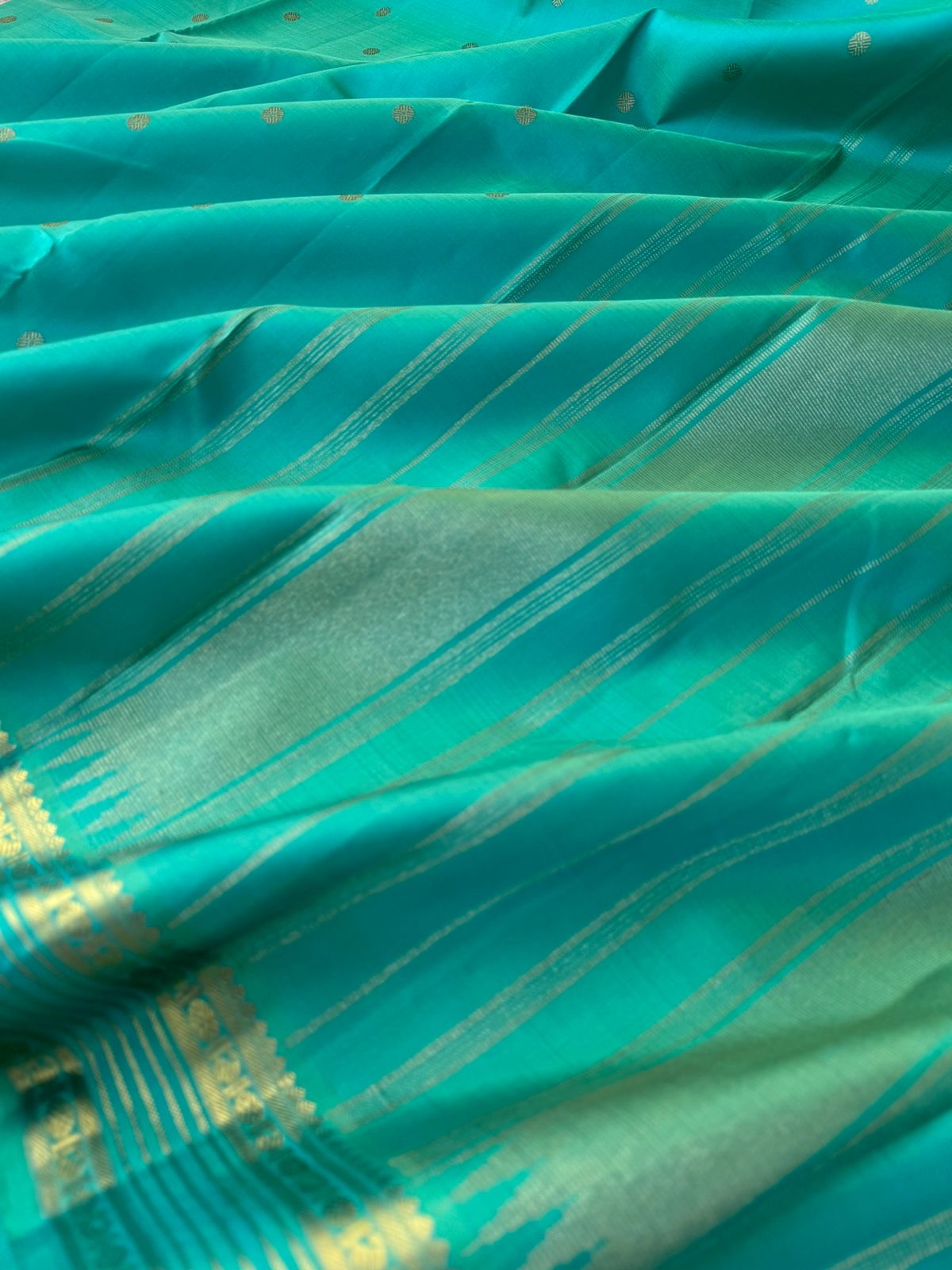 Pastel Ragas on Kanchivaram - stunning aqua blue green dual tone effect of Kanchivaram