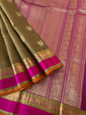 Heriyae - Molten Mettalic Kanchivarams - gorgeous metallic fenugreek bronze tone paisley and annapakshi woven buttas with majenta purple elephant motifs borders with grandest pallu