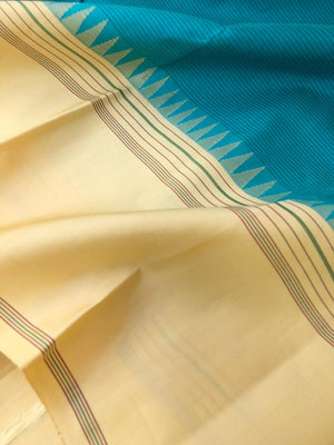 Kaavyam on Korvai Kanchivaram - gorgeous turquoise blue and creamy off white ( venn pattu ) tone borders pallu and blouse