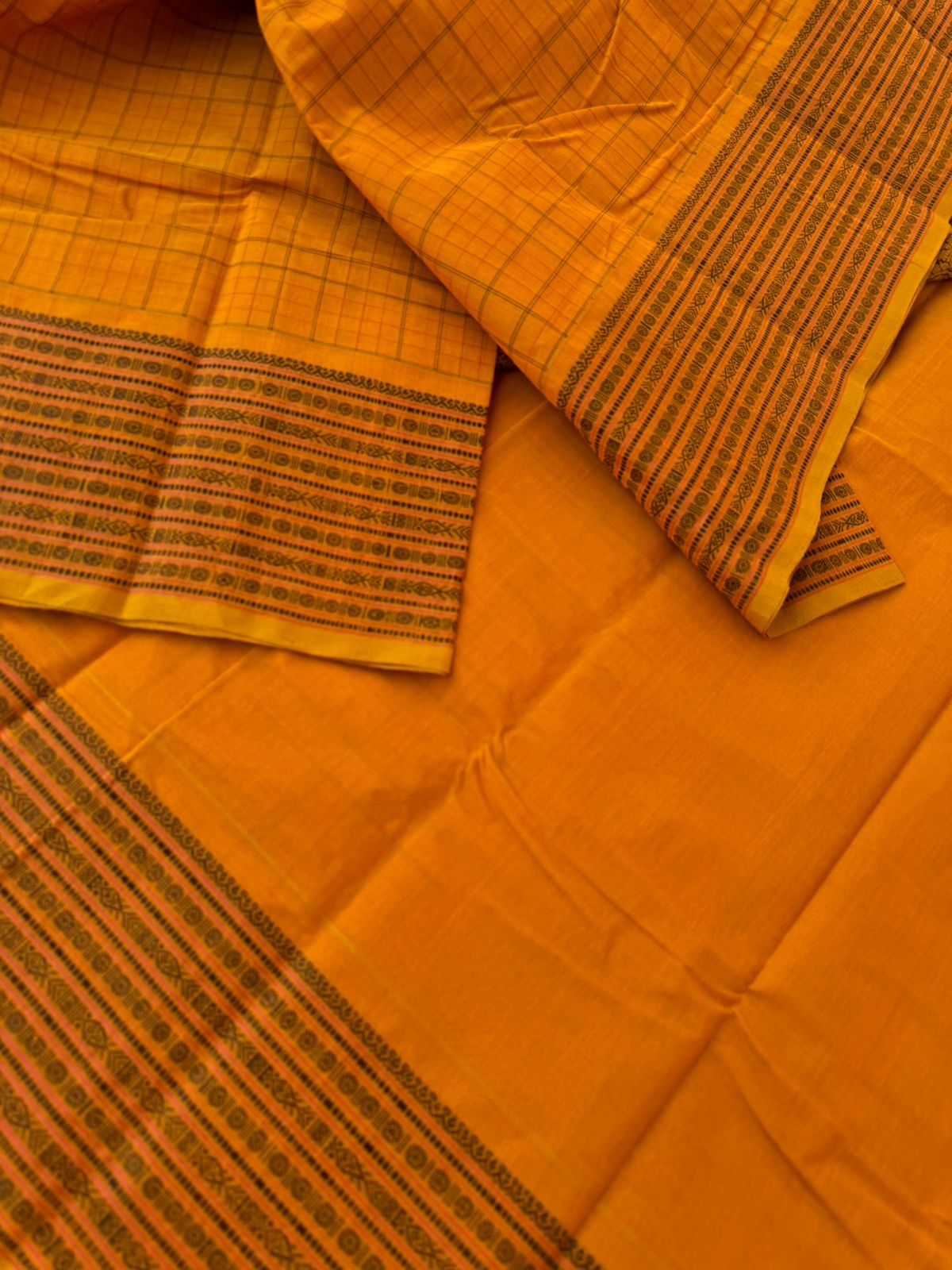 Mangalavastaram - traditional mustard chex woven body with fish pett woven borders