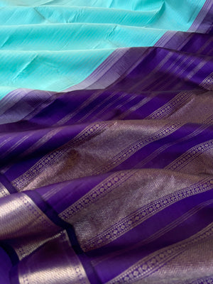 Interesting Kanchivarams - pastel baby blue and deep violet!! Combination made in heaven