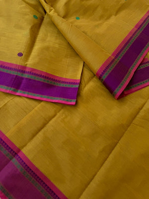 Mangalavastaram - pale mustard with annapakshi woven pallu