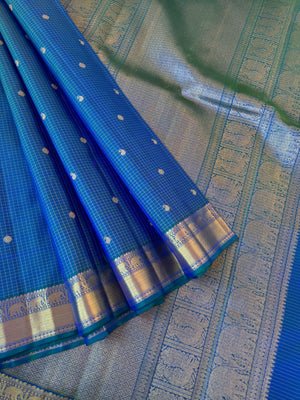 Statement of Kanchivaram - KK1 - the most beautiful dual tone peacock blue green Vairaoosi kattam with small woven borders with gorgeous grand pallu.