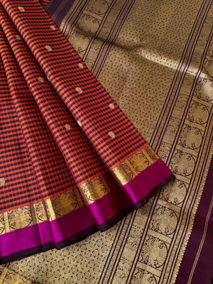 Kattam Koodu on Kanchivaram - rust and maroon podi kattam with Irruthalaipakshi woven borders