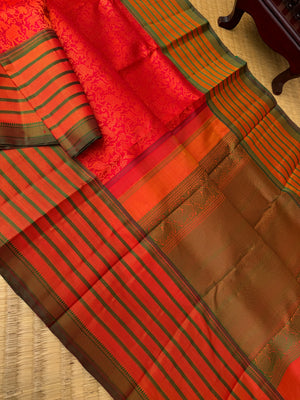 Haritham - Heirloom Yarn Play on Kanchivaram - rusty red vanasingaram woven body with varusai pett woven borders