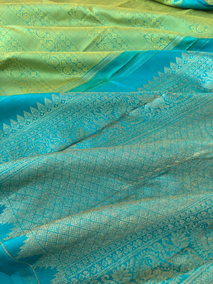 Colour Effects of Kanchivaram - the most beautiful pastel green thread woven varusai pett body with teal zari woven pallu