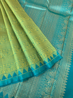 Colour Effects of Kanchivaram - the most beautiful pastel green thread woven varusai pett body with teal zari woven pallu