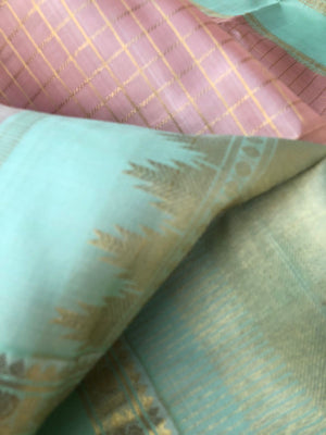 Pastel Ragas on Kanchivaram - dusky pastel rose gold muthukattam with 8 koll gold zari woven pallu