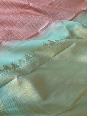 Pastel Ragas on Kanchivaram - dusky pastel rose gold muthukattam with 8 koll gold zari woven pallu