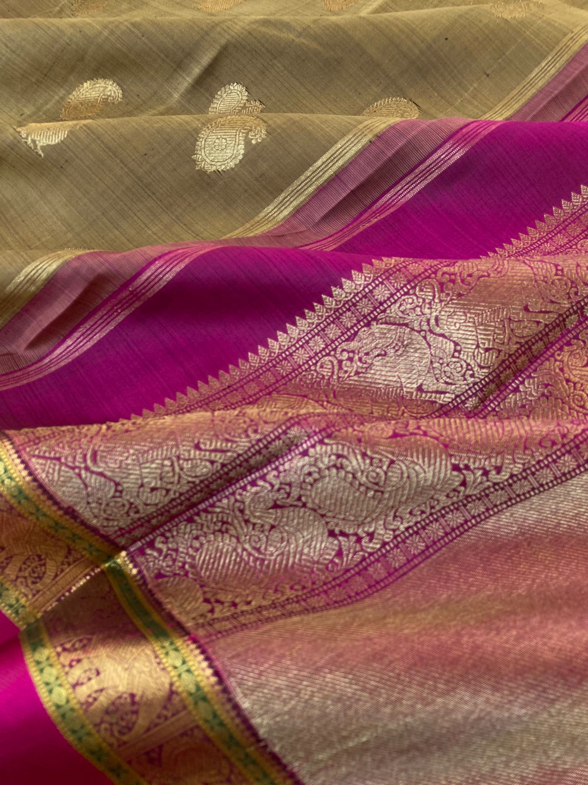 Heriyae - Molten Mettalic Kanchivarams - gorgeous metallic fenugreek bronze tone paisley and annapakshi woven buttas with majenta purple elephant motifs borders with grandest pallu