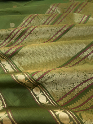 Zari Kissed Silk Cotton - stunning olive green kolam buttas with retta pett woven borders